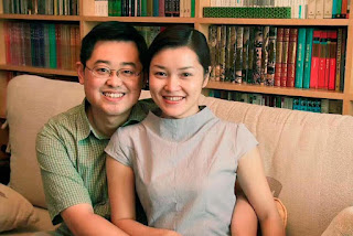 Pastor Wang Yi of Early Rain Covenant Church with his wife, Jiang Rong