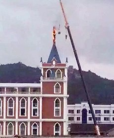 The cross of a church in Yuhuan, Taizhou was forcibly demolished during the 2015 Zhejiang Demolition Movement