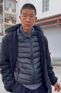 Li Lei, a policeman from the Public Security Bureau of Chuxiong City, Yunnan Province, who kpet surveillance on Wang Liqin