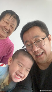 Xu Feng and their son who has cerebral palsy