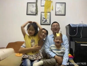 Xu Feng, headmaster of Maizi Christian Music Highschool, with his family