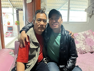 Wang Shunping and his father, Elder La