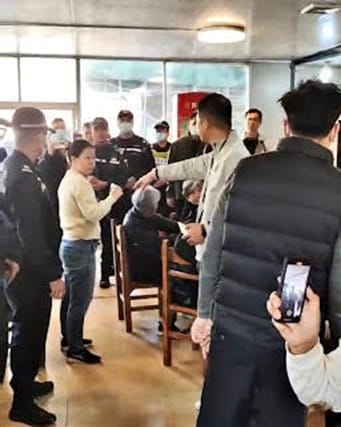 Police raided Guangzhou Bible Reformed Church, searching the location where they were having a meal. (Photo Credit: ChinaAid)