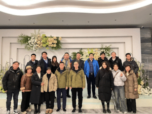 Wan Chunqin, Xue Shaoqiang and Cao Binting with their lawyers after being released on bail